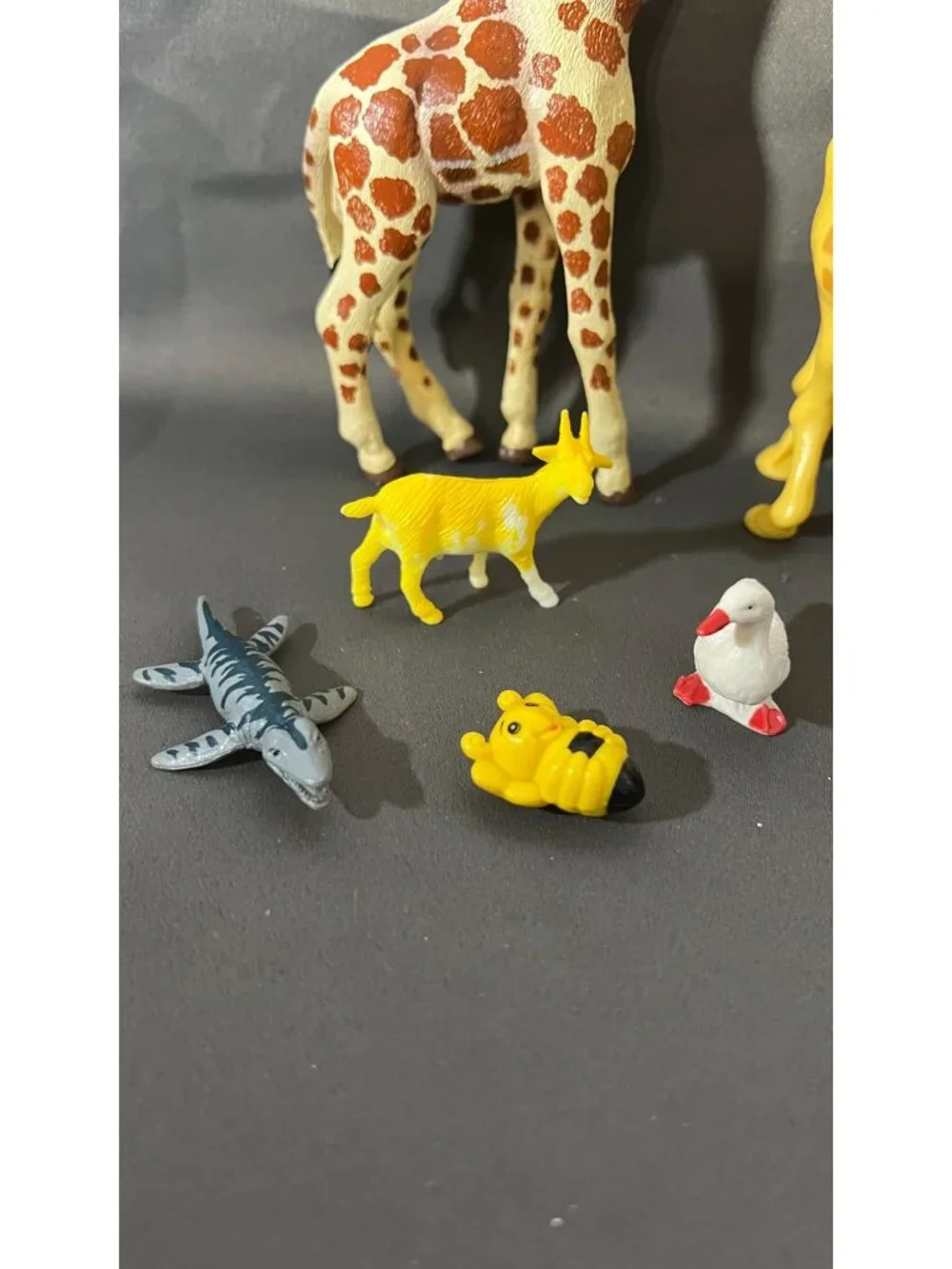 Assorted Animal Figurines Lot Includes Giraffes Lion Shark Goat Bee & More
